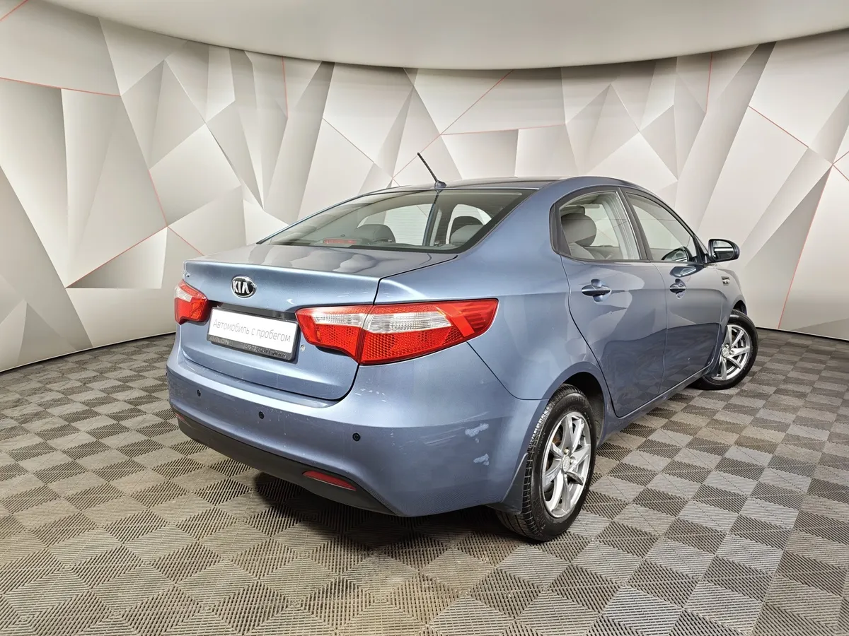 Kia Rio 1.4 AT (107 л.с.) Голубой в АВИЛОН. Слайд №2
