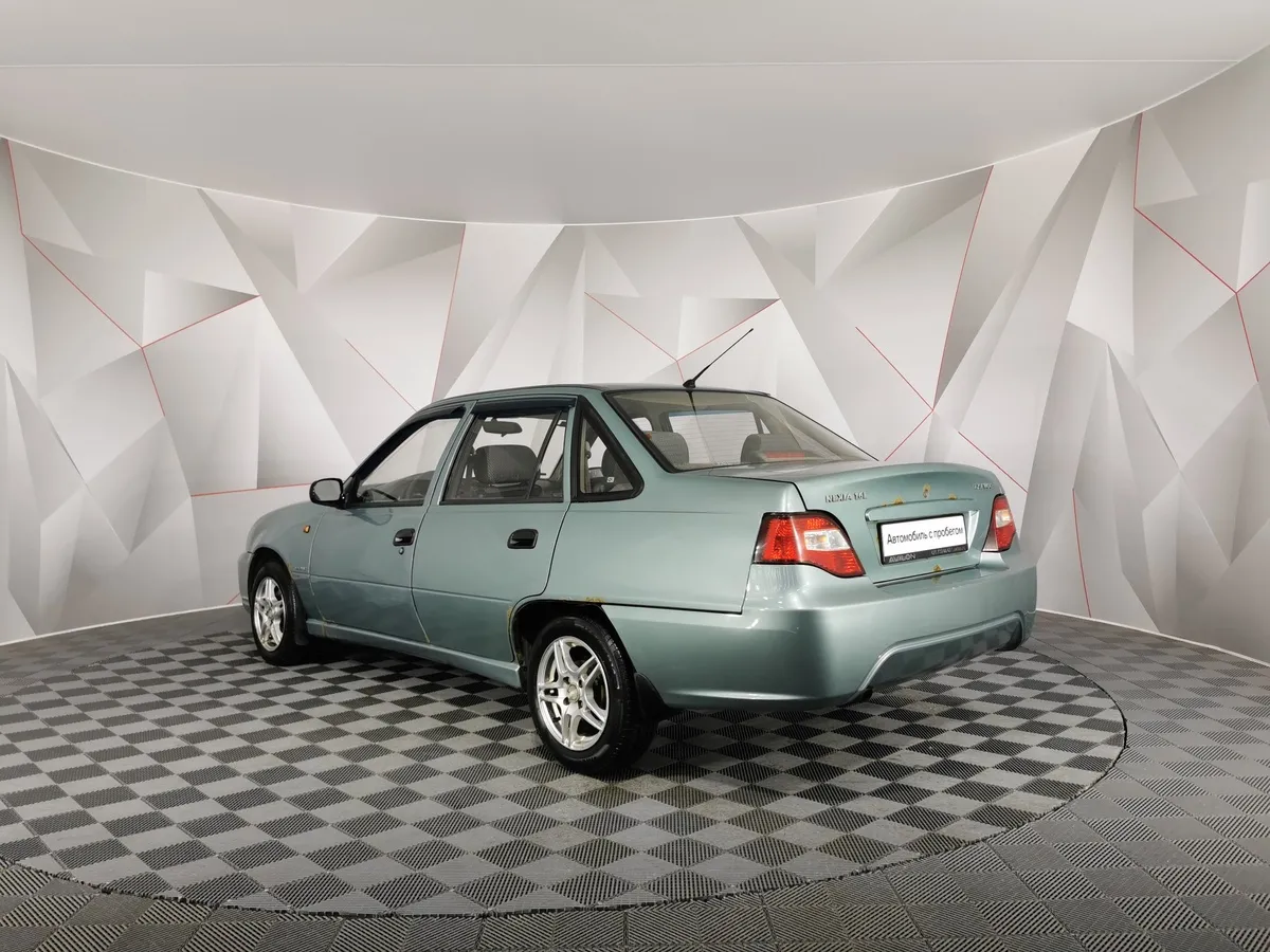 Daewoo Nexia 1.6 MT (109 л.с.) Зеленый в АВИЛОН. Слайд №4
