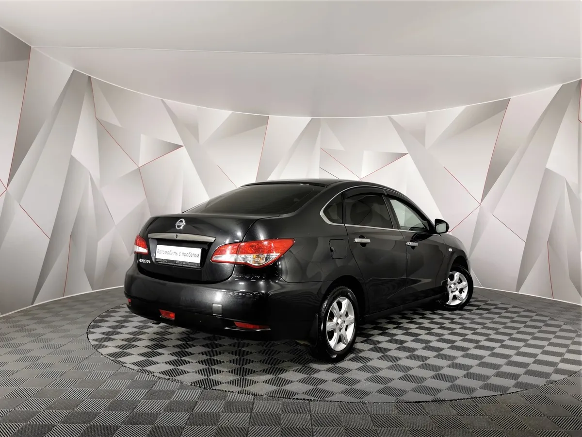 Nissan Almera 1.6 MT (102 л.с.) Черный в АВИЛОН. Слайд №2