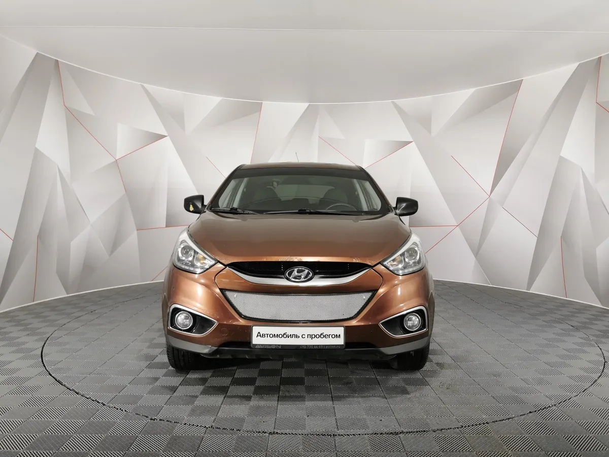 Hyundai ix35 2.0 AT (150 л.с.) Коричневый в АВИЛОН. Слайд №7