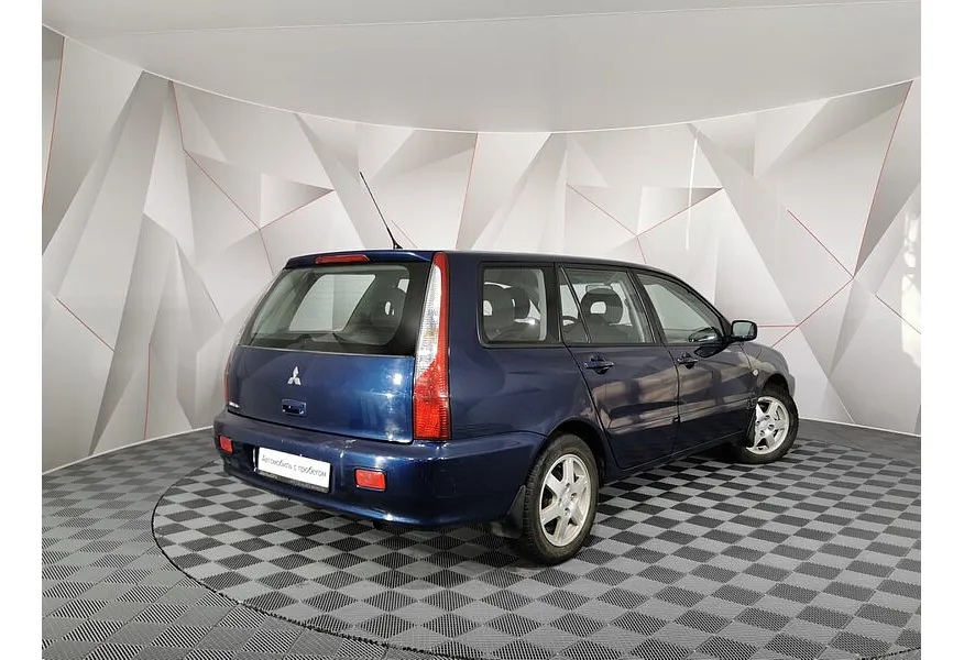 Mitsubishi Lancer 1.6 MT (100 л.с.) Синий в АВИЛОН. Слайд №8