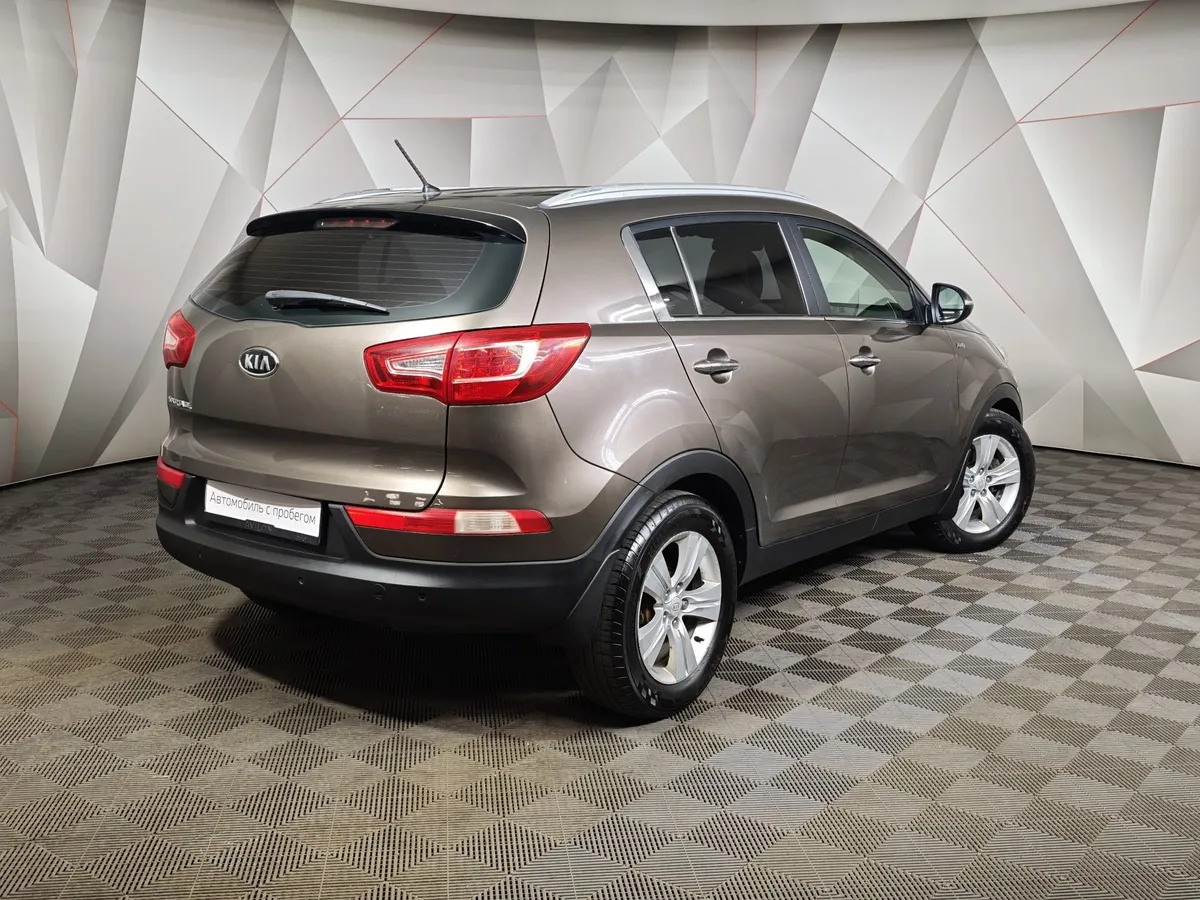 Kia Sportage 2.0 AT 4WD (150 л.с.) Luxe Коричневый в АВИЛОН. Слайд №2