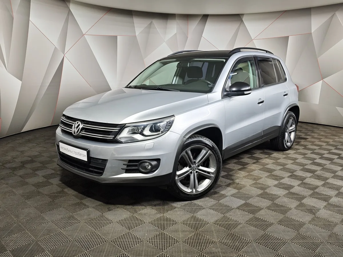 Volkswagen Tiguan 1.4 TSI BlueMotion DSG (150 л.с.) Sport&Style Черный в АВИЛОН. Слайд №1