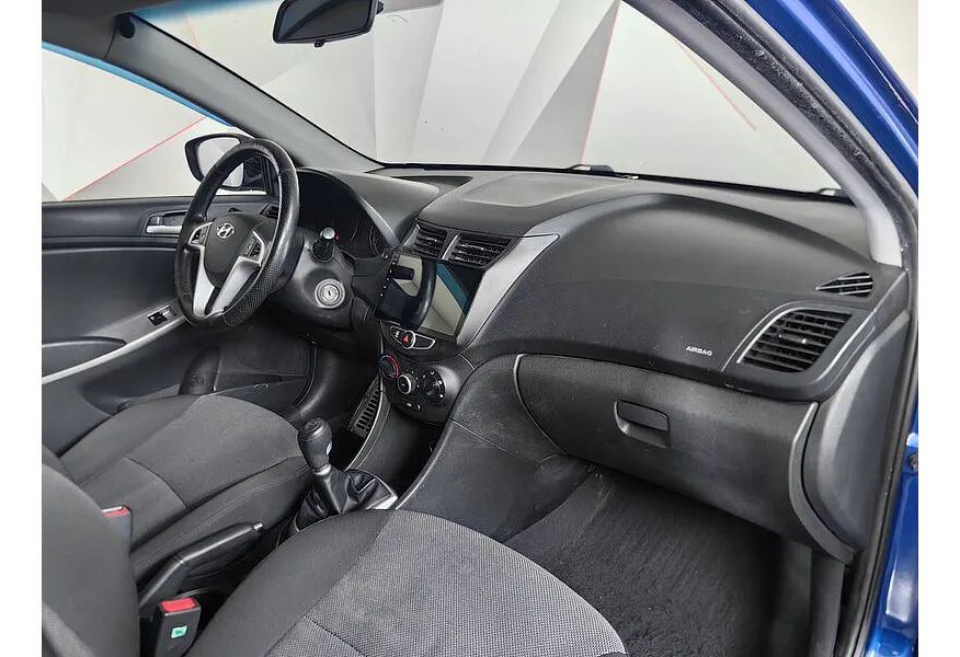 Hyundai Solaris 1.4 MT (107 л.с.) Optima Синий в АВИЛОН. Слайд №11