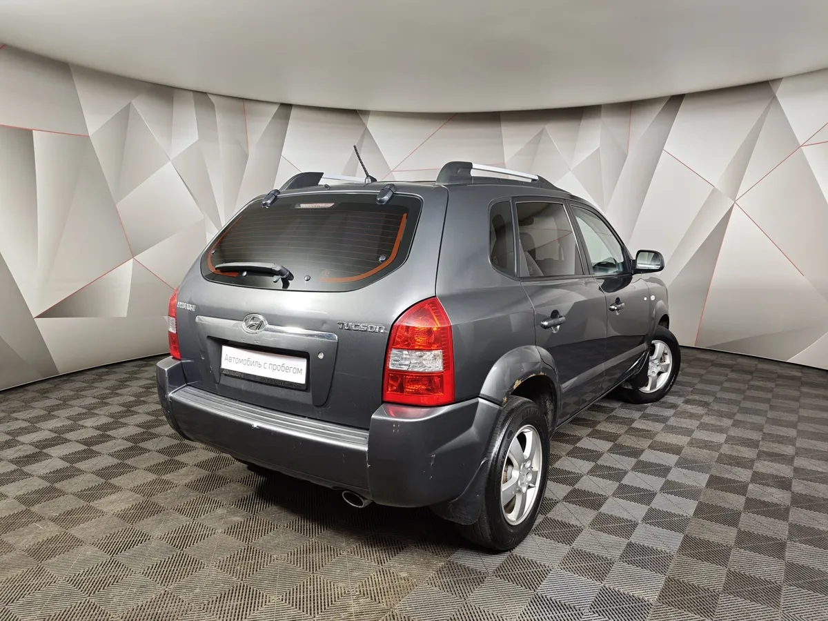 Hyundai Tucson 2.0 AT 4WD (142 л.с.) Серый в АВИЛОН. Слайд №2