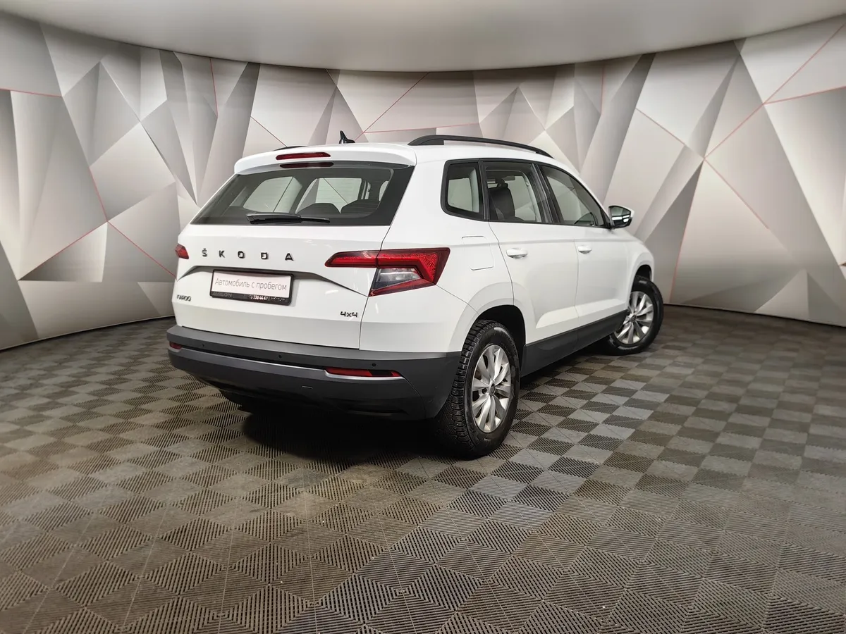 Skoda Karoq 1.4 AMT AWD (150 л.с.) Ambition Белый в АВИЛОН. Слайд №2