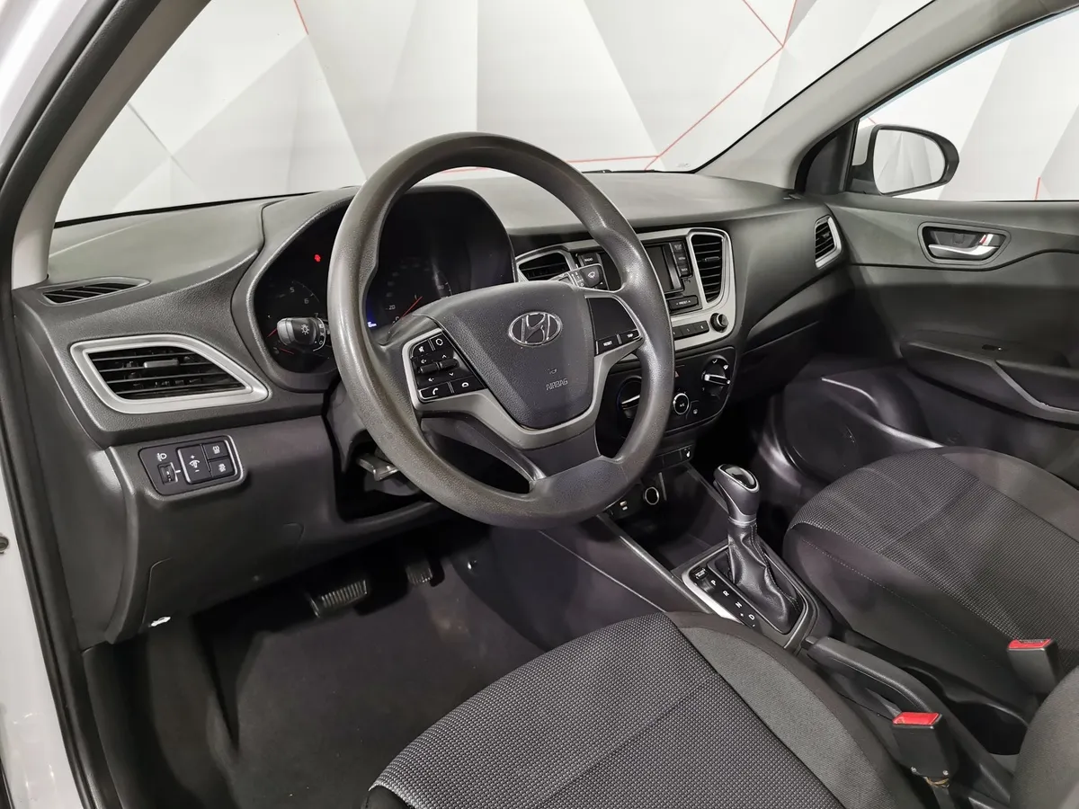 Hyundai Solaris 1.6 AT (123 л.с.) Comfort Белый в АВИЛОН. Слайд №17