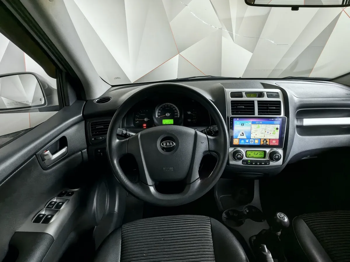 Kia Sportage 2.0 CRDi AT 4WD (112 л.с.) Серебристый в АВИЛОН. Слайд №19