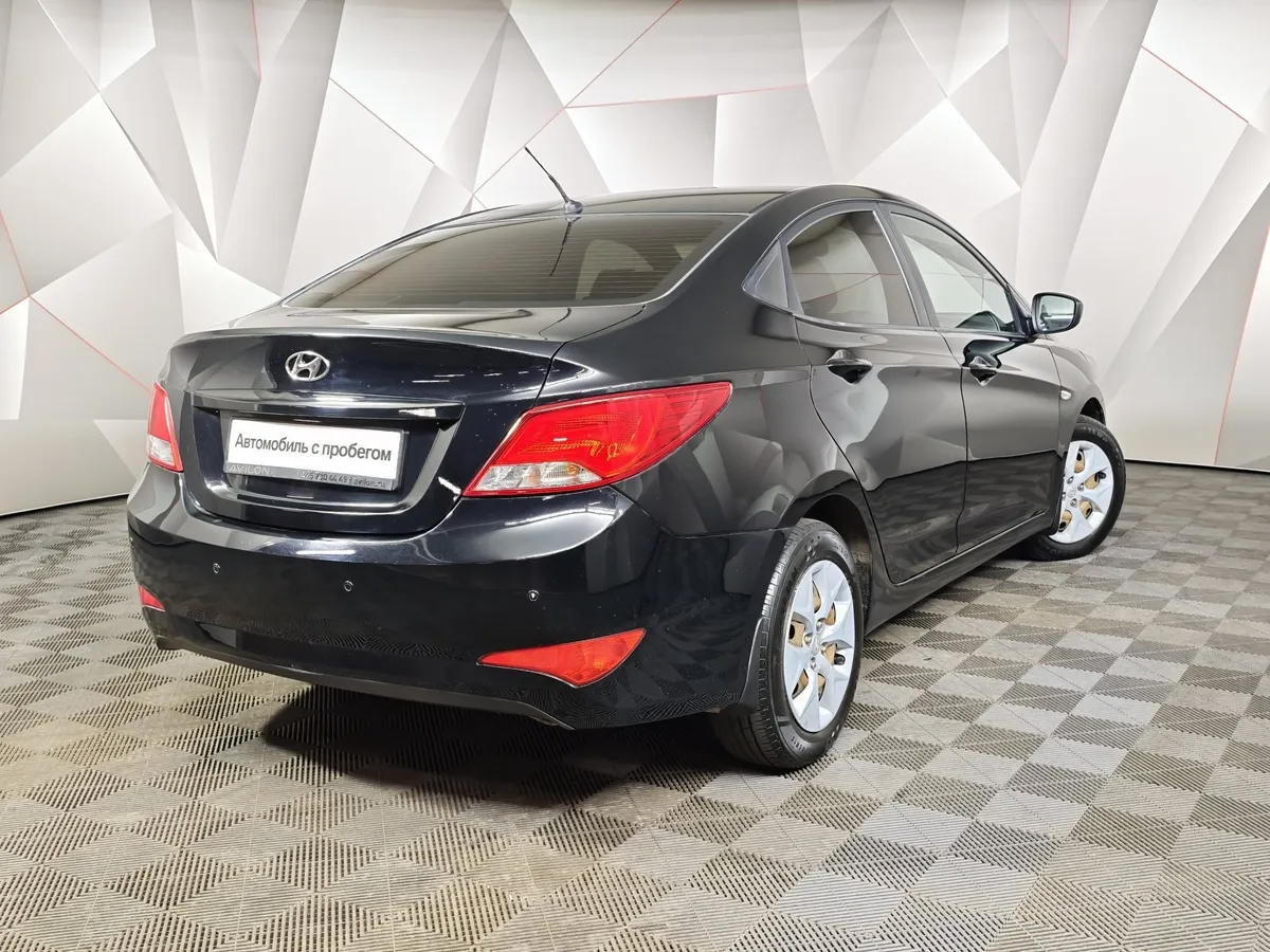 Hyundai Solaris 1.6 AT (123 л.с.) Comfort Черный в АВИЛОН. Слайд №2
