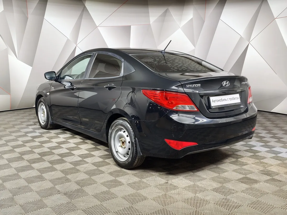 Hyundai Solaris 1.4 MT (107 л.с.) Comfort Черный в АВИЛОН. Слайд №4