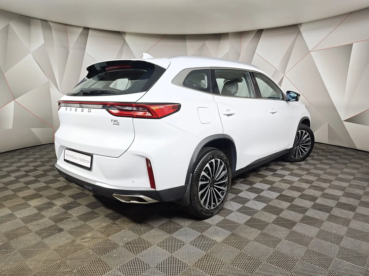 EXEED TXL 1.6 TGDI DCT7 AWD (186 л.с.) Белый в АВИЛОН. Слайд №2