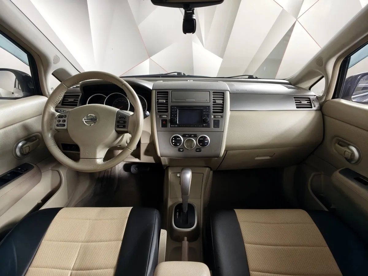 Nissan Tiida 1.6 AT (110 л.с.) Черный в АВИЛОН. Слайд №13