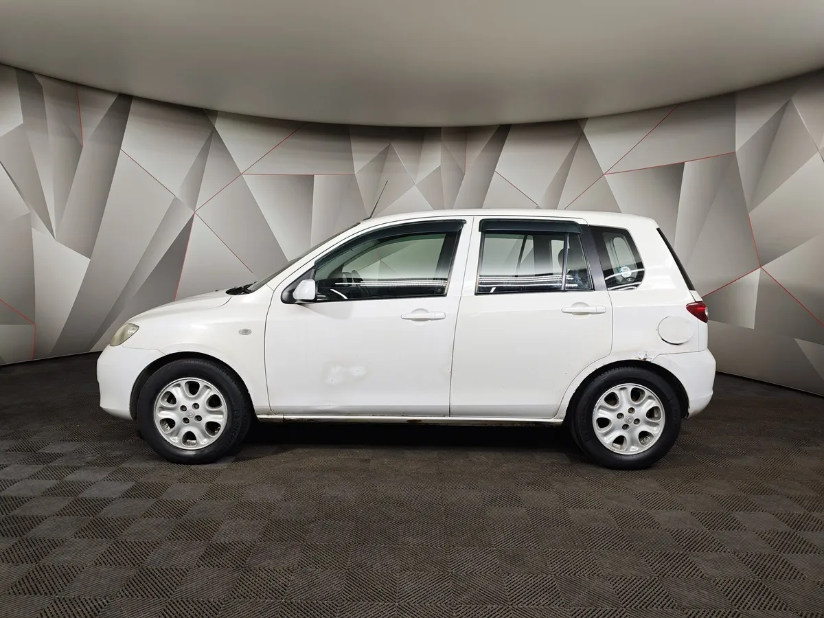Mazda Demio 1.5 AT (100 л.с.) Белый в АВИЛОН. Слайд №5
