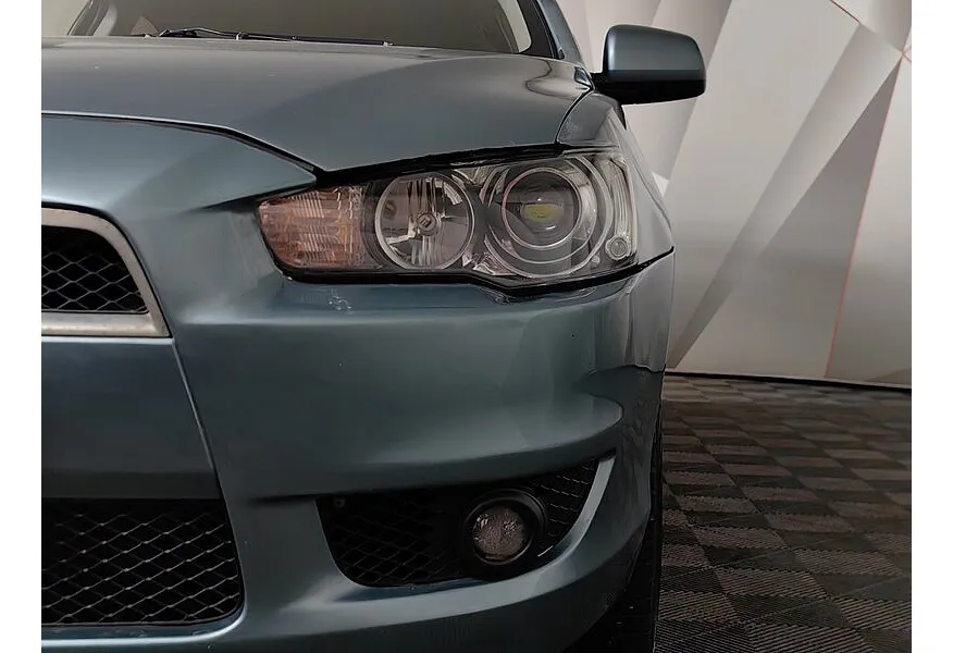 Mitsubishi Lancer 1.6 AT (117 л.с.) Зеленый в АВИЛОН. Слайд №10