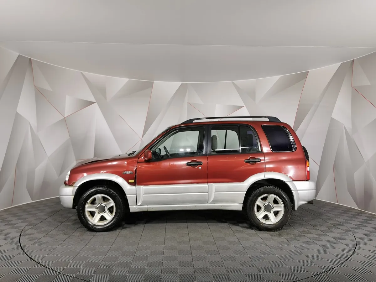 Suzuki Grand Vitara 2.5 AT 4WD (144 л.с.) Красный в АВИЛОН. Слайд №5