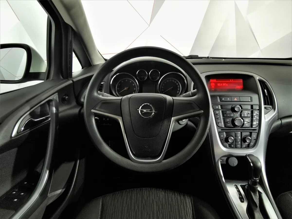 Opel Astra 1.6 AT (115 л.с.) Белый в АВИЛОН. Слайд №19