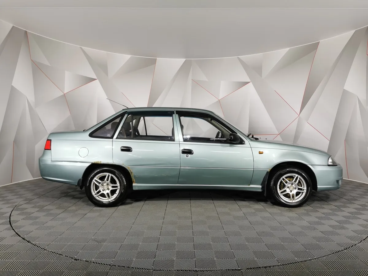 Daewoo Nexia 1.6 MT (109 л.с.) Зеленый в АВИЛОН. Слайд №6