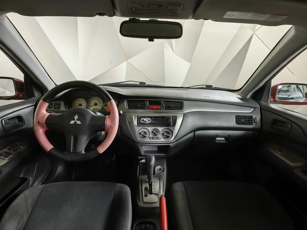 Mitsubishi Lancer 1.6 AT (98 л.с.) Красный в АВИЛОН. Слайд №9