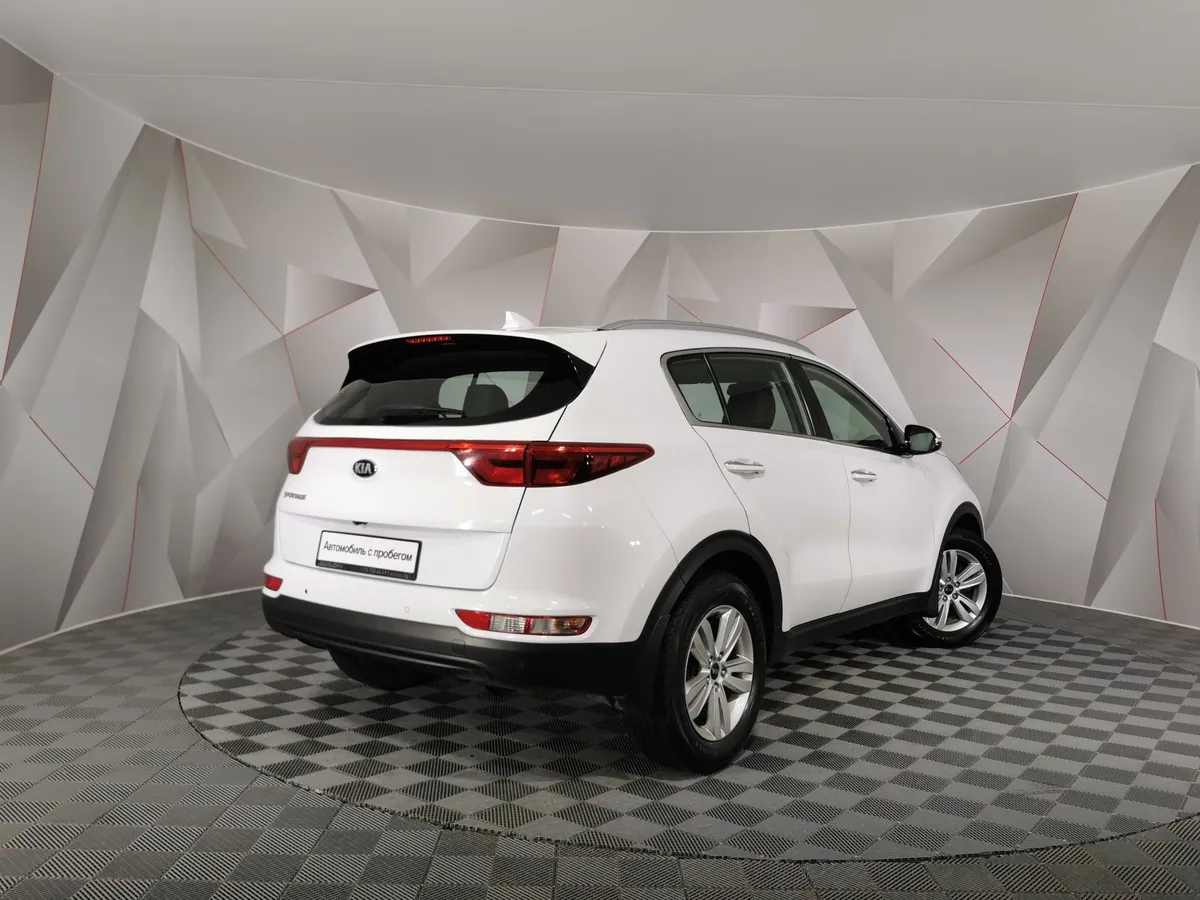 Kia Sportage 2.0 AT (150 л.с.) Белый в АВИЛОН. Слайд №2
