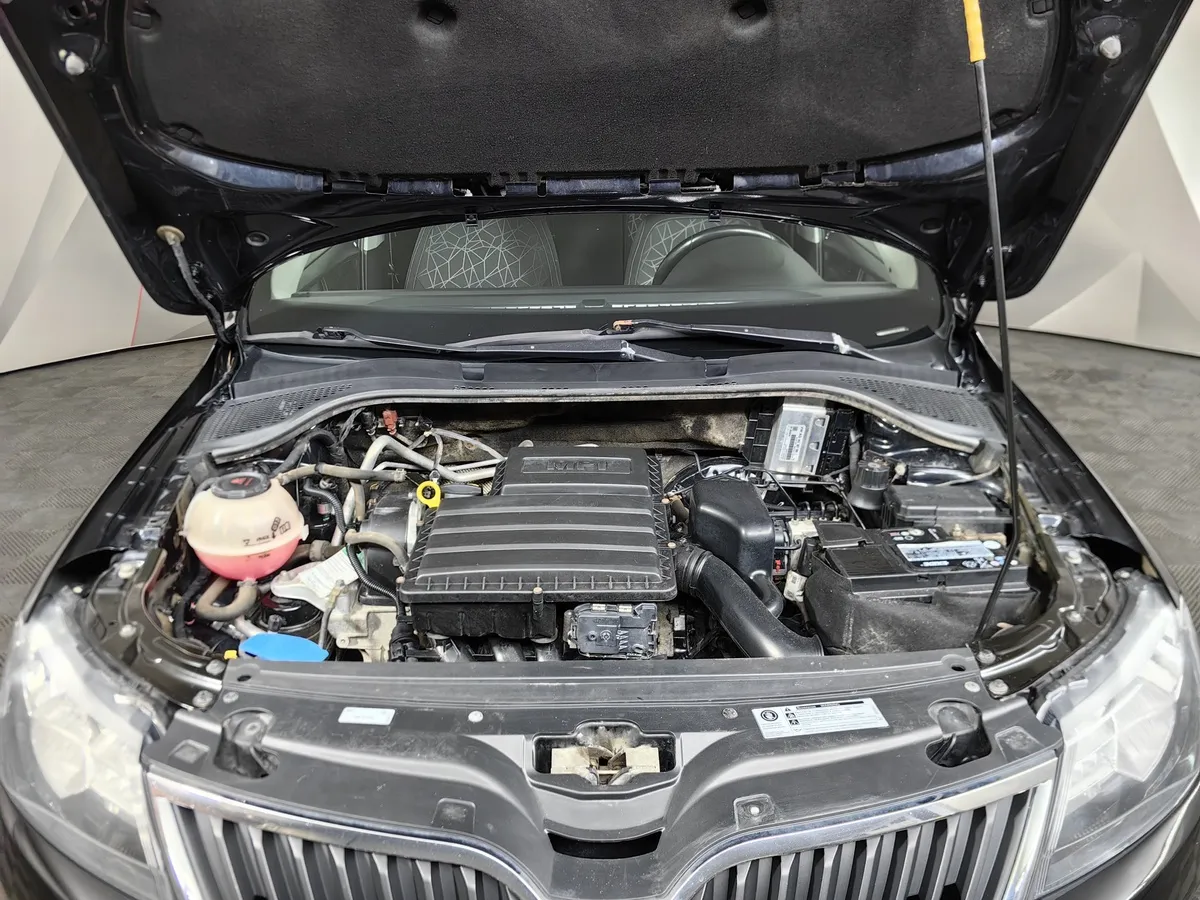 Skoda Rapid 1.6 MT (90 л.с.) Черный в АВИЛОН. Слайд №11