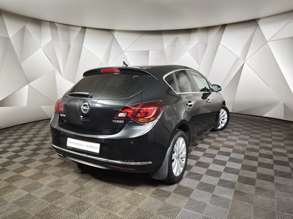 Opel Astra 1.6 Turbo AT (180 л.с.) Cosmo Черный в АВИЛОН. Слайд №2