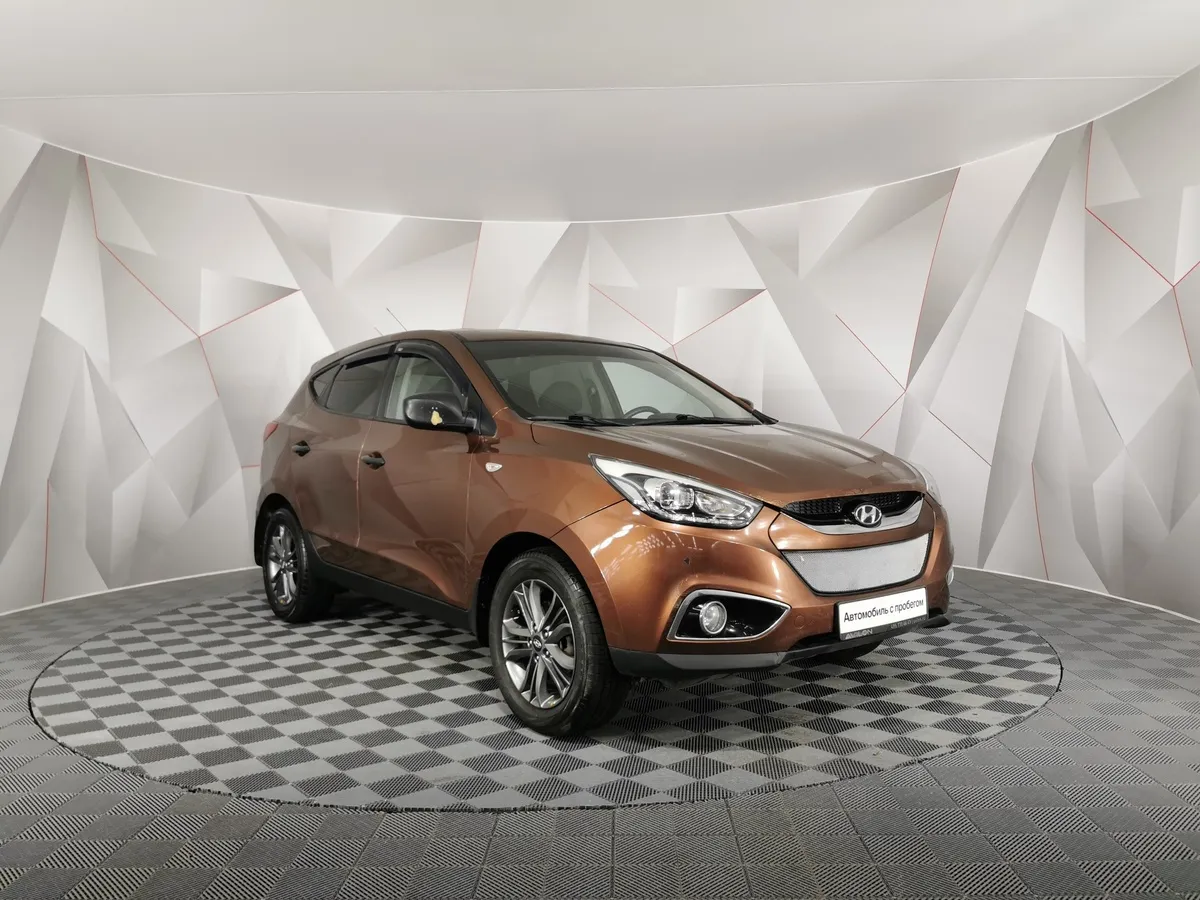 Hyundai ix35 2.0 AT (150 л.с.) Коричневый в АВИЛОН. Слайд №3