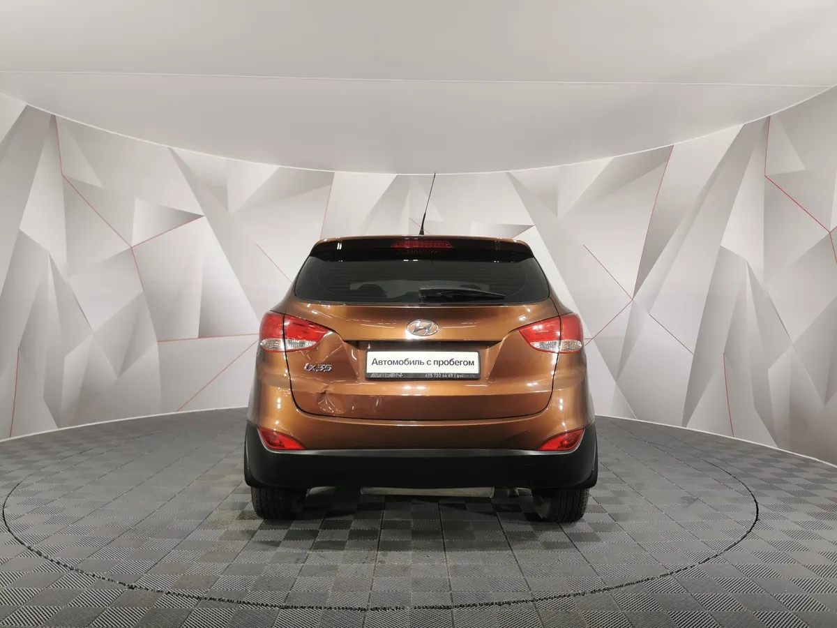 Hyundai ix35 2.0 AT (150 л.с.) Коричневый в АВИЛОН. Слайд №8