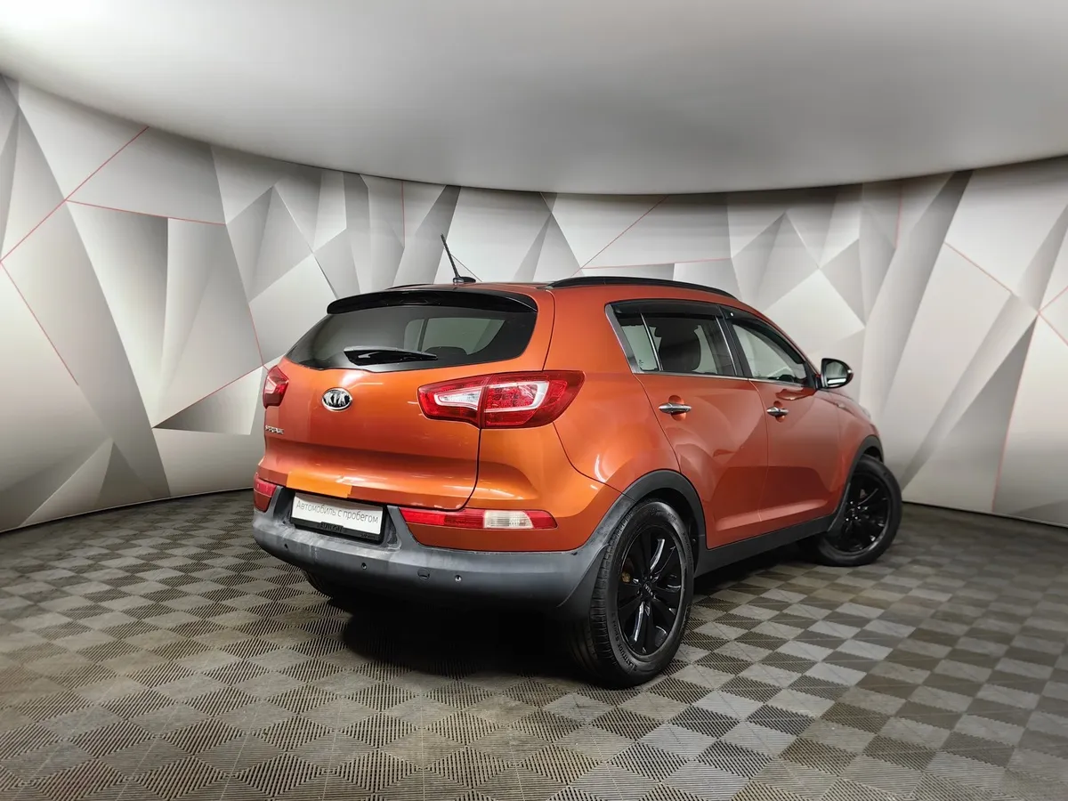 Kia Sportage 2.0 AT AWD (150 л.с.) Оранжевый в АВИЛОН. Слайд №2