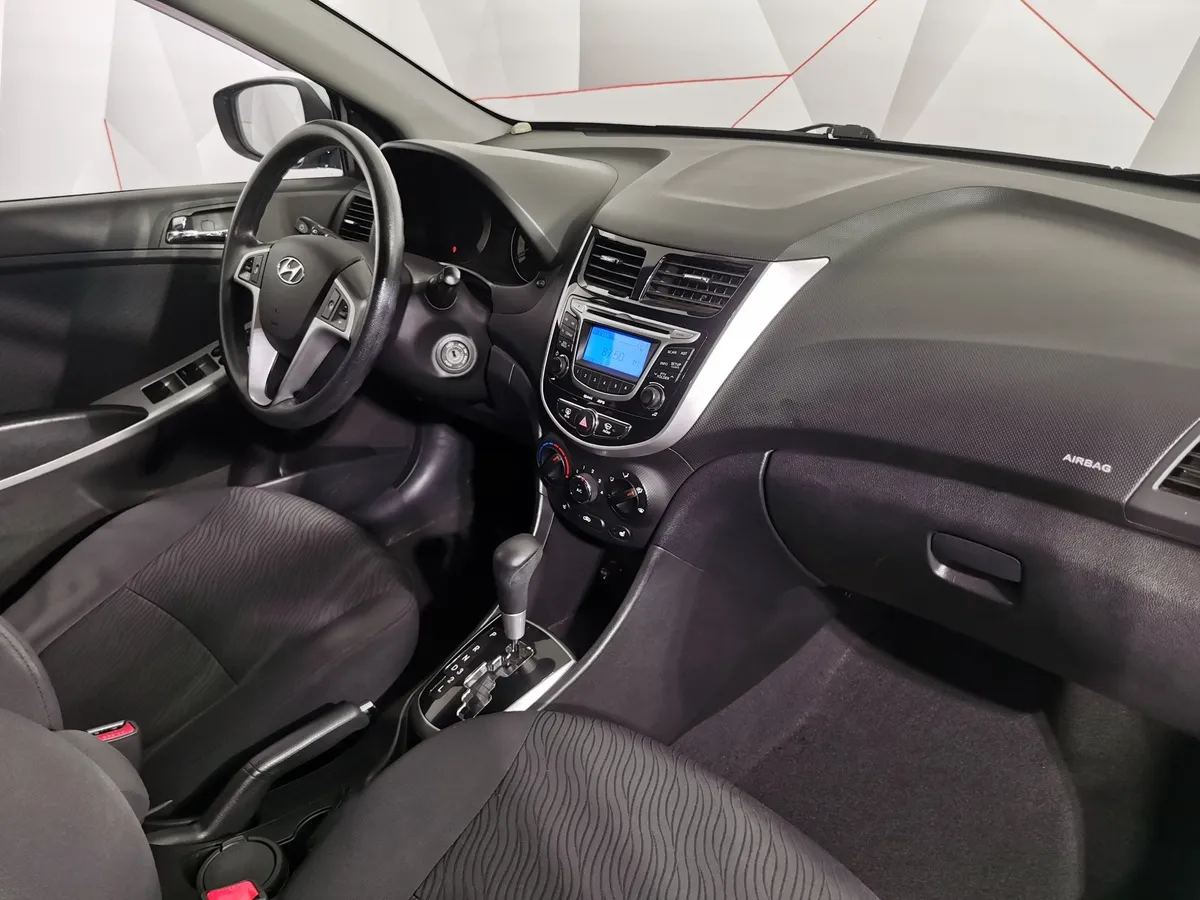 Hyundai Solaris 1.4 AT (107 л.с.) Comfort Голубой в АВИЛОН. Слайд №11