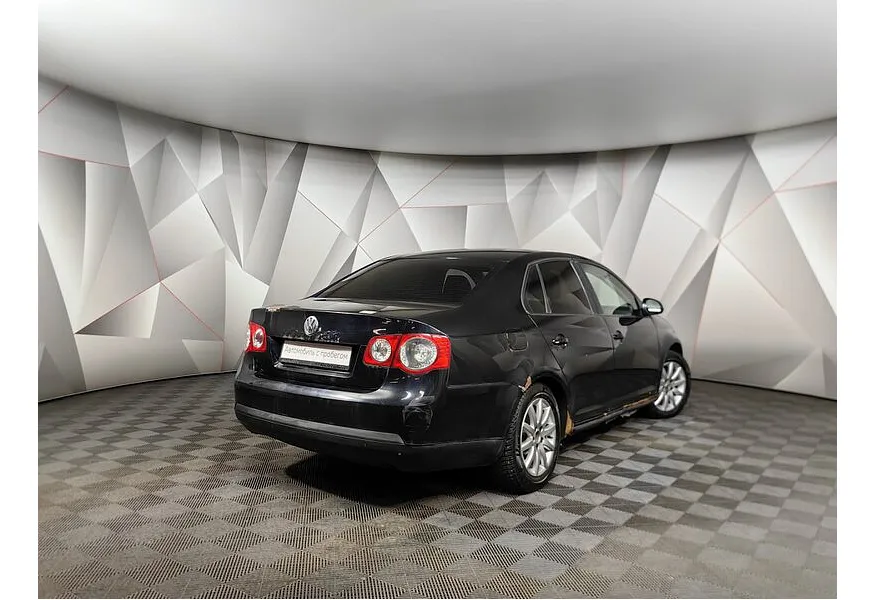 Volkswagen Jetta 1.6 MT (102 л.с.) Trendline Черный в АВИЛОН. Слайд №2