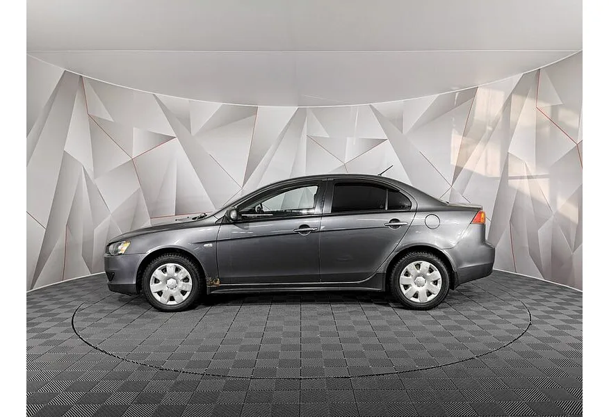 Mitsubishi Lancer 1.8 MT (143 л.с.) Серый в АВИЛОН. Слайд №5