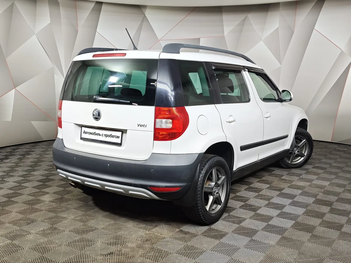 Skoda Yeti 1.2 TSI DSG (105 л.с.) Active Белый в АВИЛОН. Слайд №2