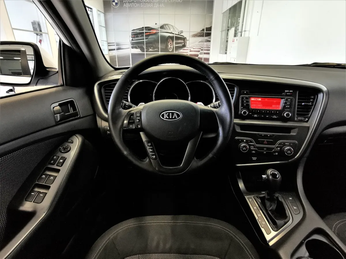 Kia Optima 2.0 AT (150 л.с.) Comfort Белый в АВИЛОН. Слайд №19