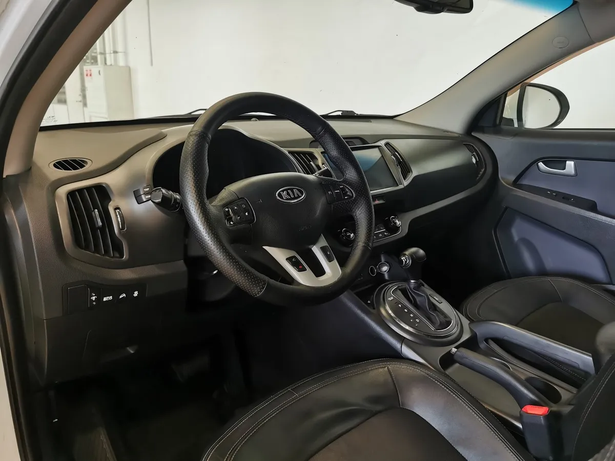 Kia Sportage 2.0 TD AT 4WD (136 л.с.) Белый в АВИЛОН. Слайд №18