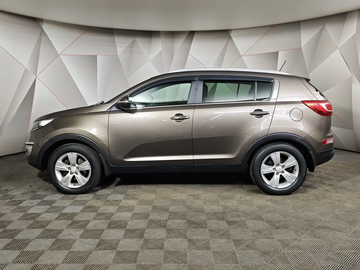 Kia Sportage 2.0 AT AWD (150 л.с.) Коричневый в АВИЛОН. Слайд №5