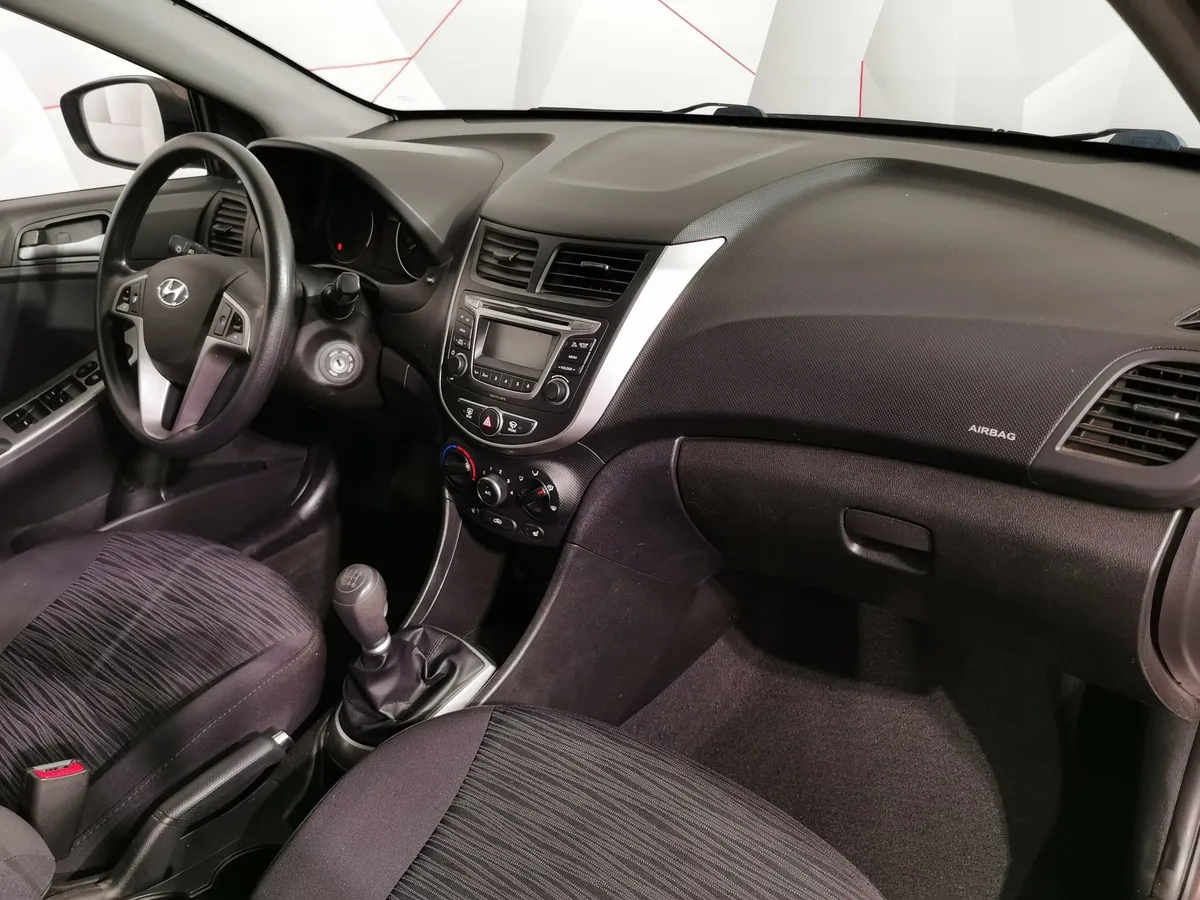 Hyundai Solaris 1.6 MT (123 л.с.) Comfort Коричневый в АВИЛОН. Слайд №12