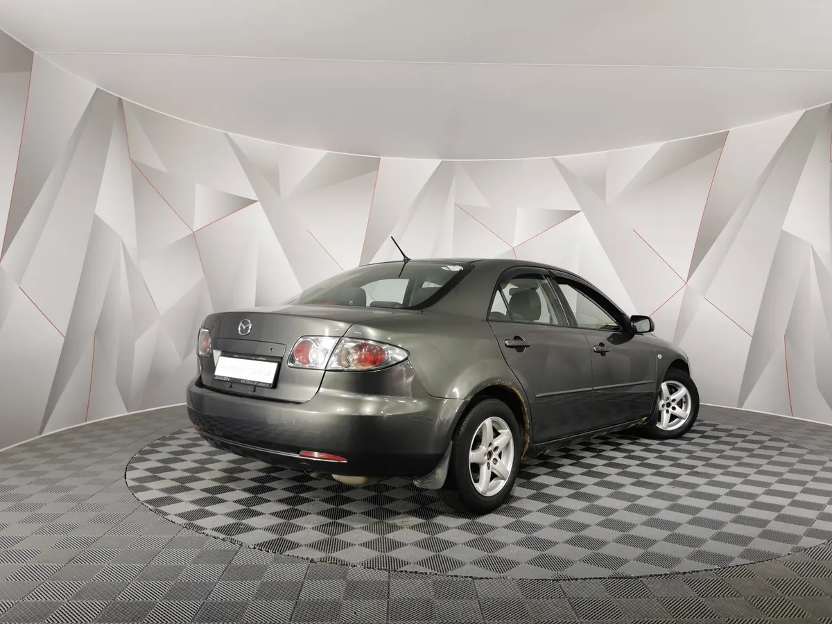 Mazda 6 1.8 MT (120 л.с.) Серый в АВИЛОН. Слайд №2