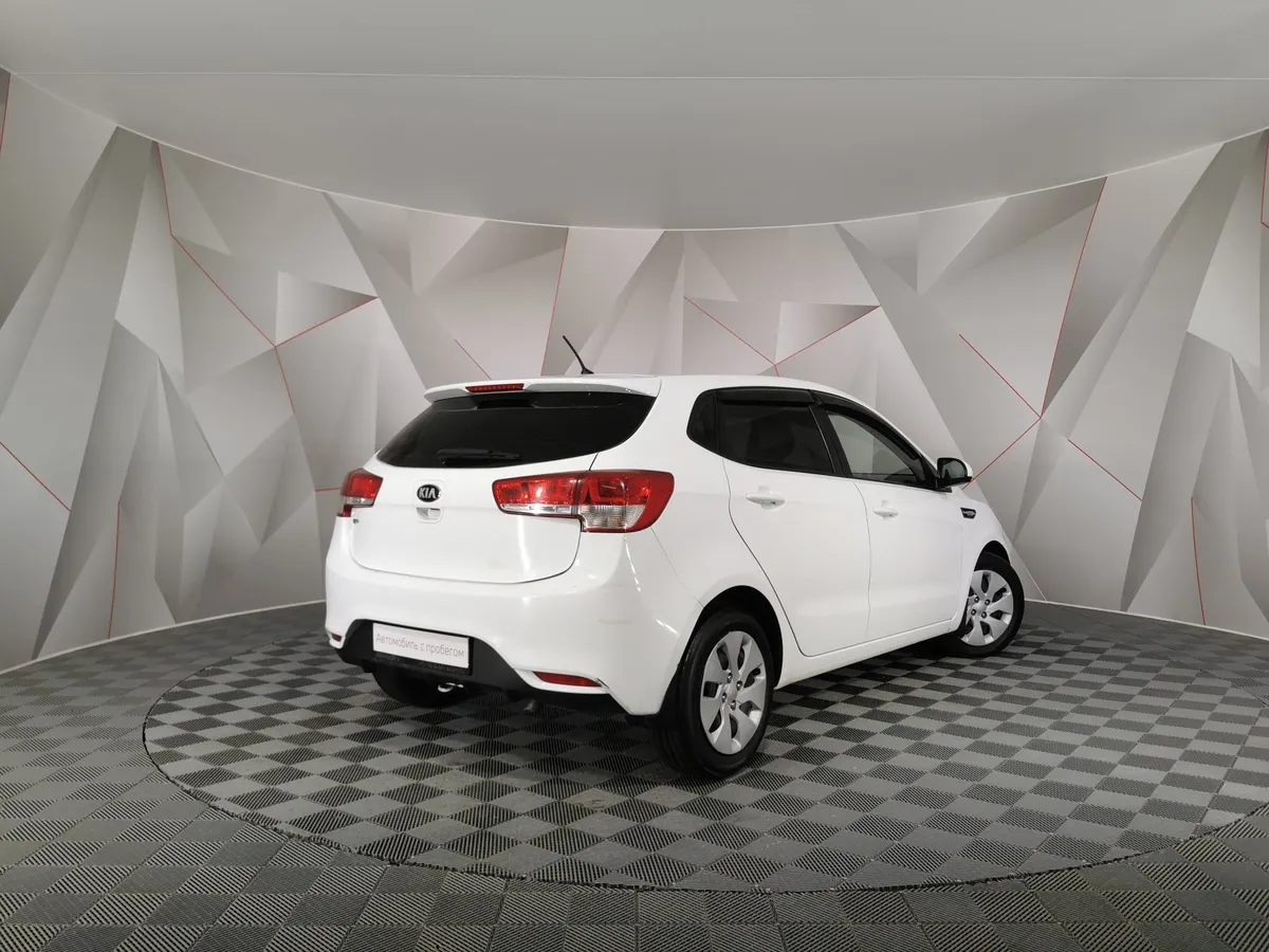 Kia Rio 1.6 MT (123 л.с.) Comfort Белый в АВИЛОН. Слайд №2