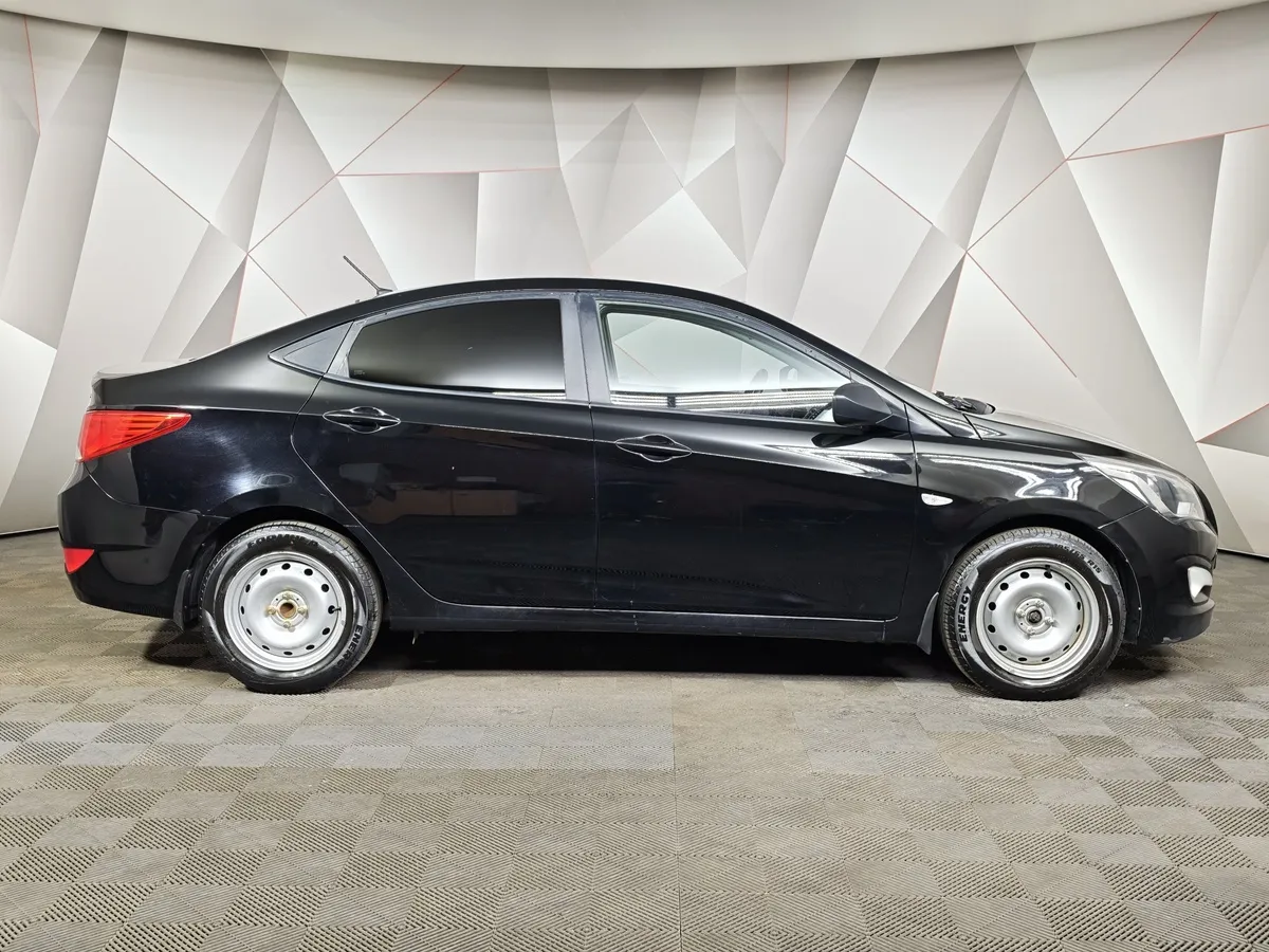 Hyundai Solaris 1.4 MT (107 л.с.) Comfort Черный в АВИЛОН. Слайд №6