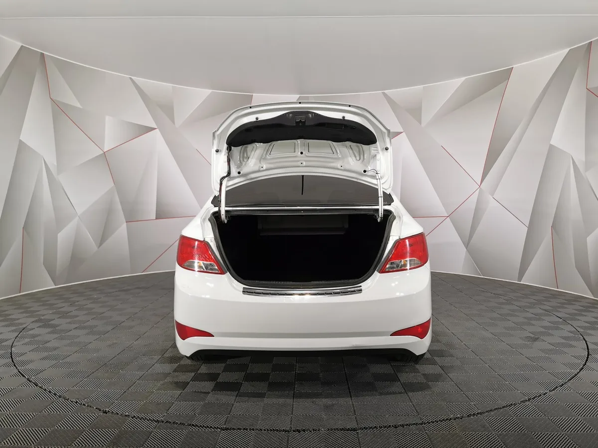 Hyundai Solaris 1.6 MT (123 л.с.) Белый в АВИЛОН. Слайд №11