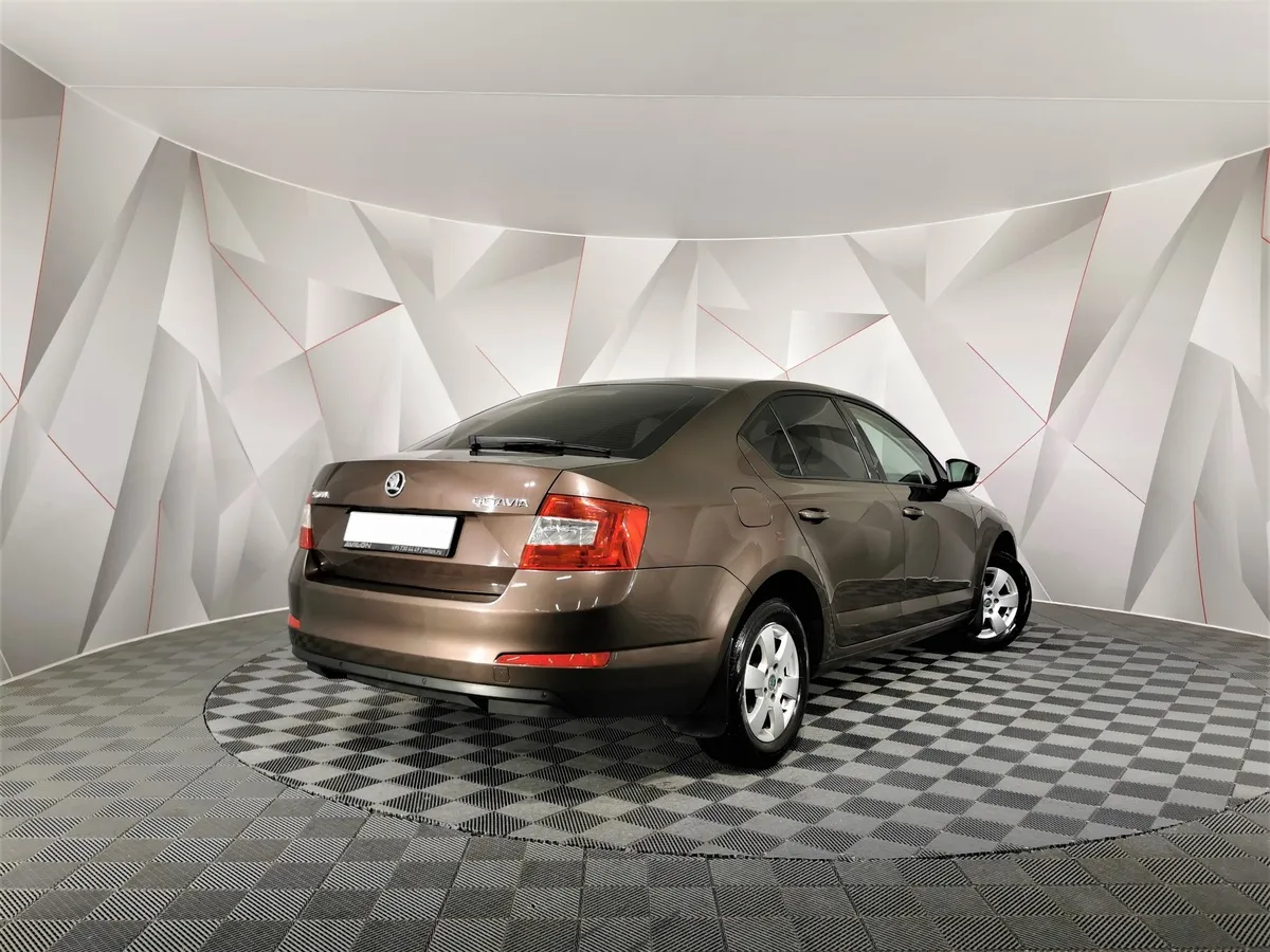 Skoda Octavia 1.6 MPI AT (110 л.с.) Коричневый в АВИЛОН. Слайд №2