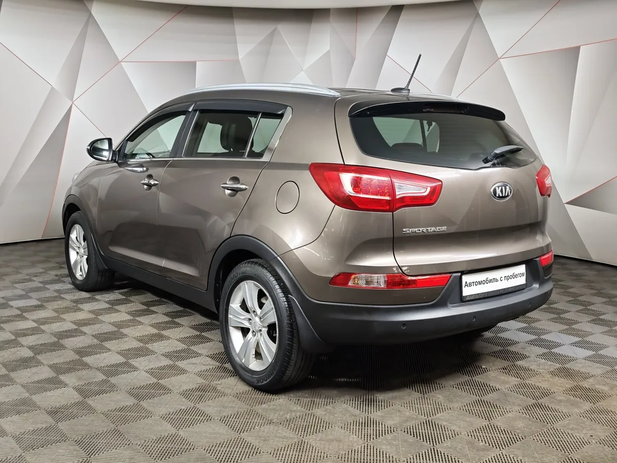 Kia Sportage 2.0 AT AWD (150 л.с.) Коричневый в АВИЛОН. Слайд №4