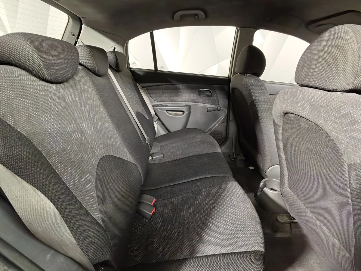 Kia Rio 1.4 MT (97 л.с.) Бежевый в АВИЛОН. Слайд №14