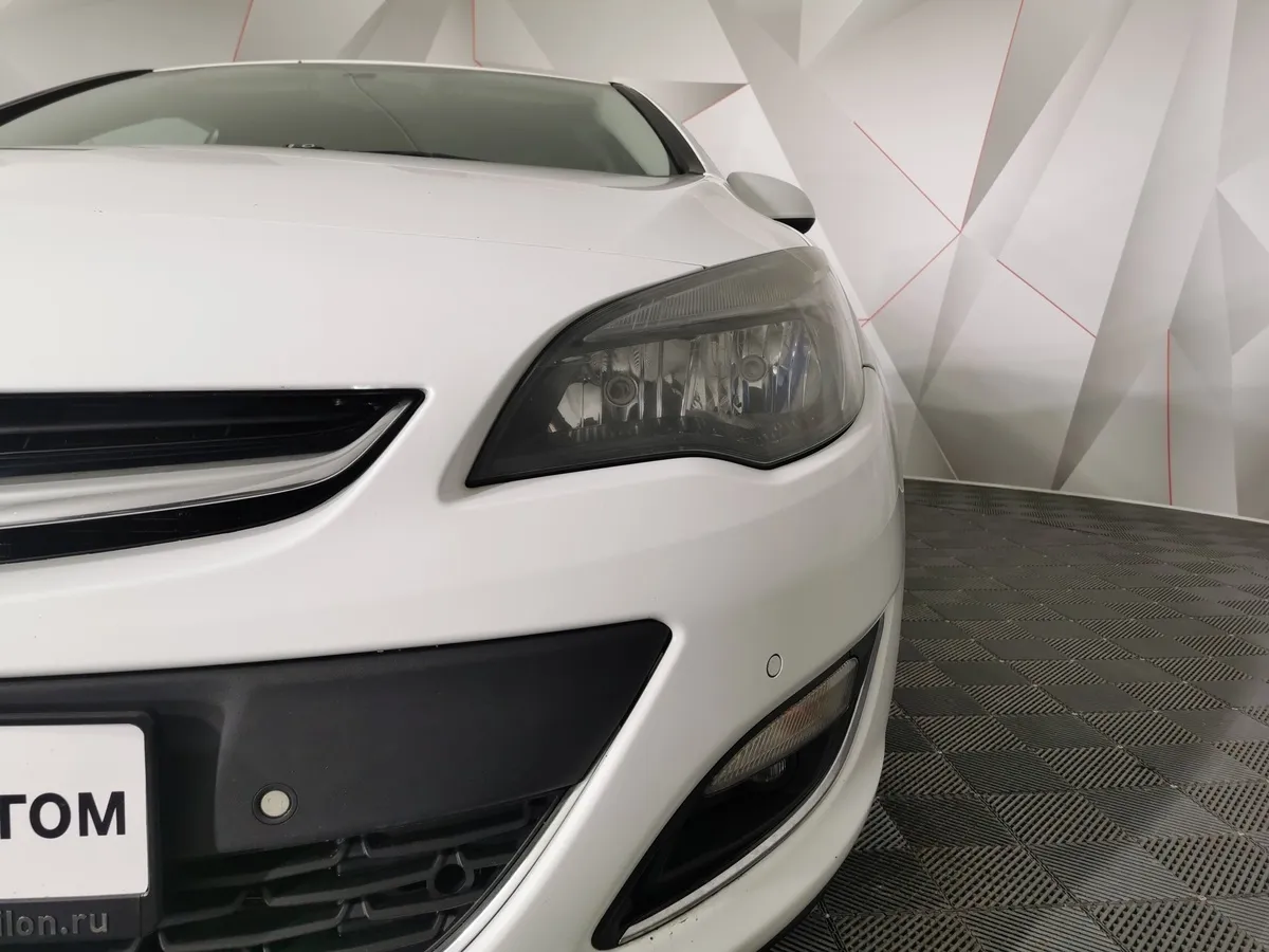Opel Astra 1.6 AT (115 л.с.) Белый в АВИЛОН. Слайд №10