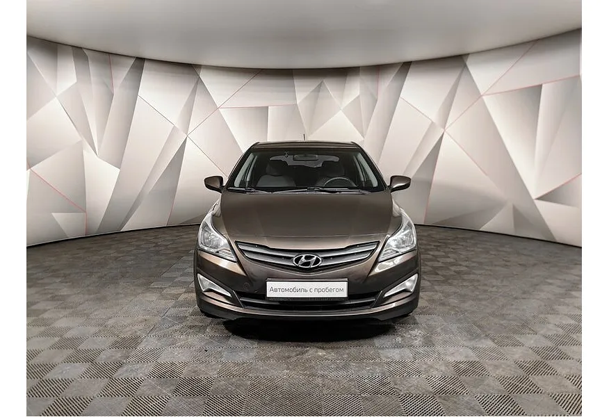 Hyundai Solaris 1.4 AT (107 л.с.) Comfort Коричневый в АВИЛОН. Слайд №7