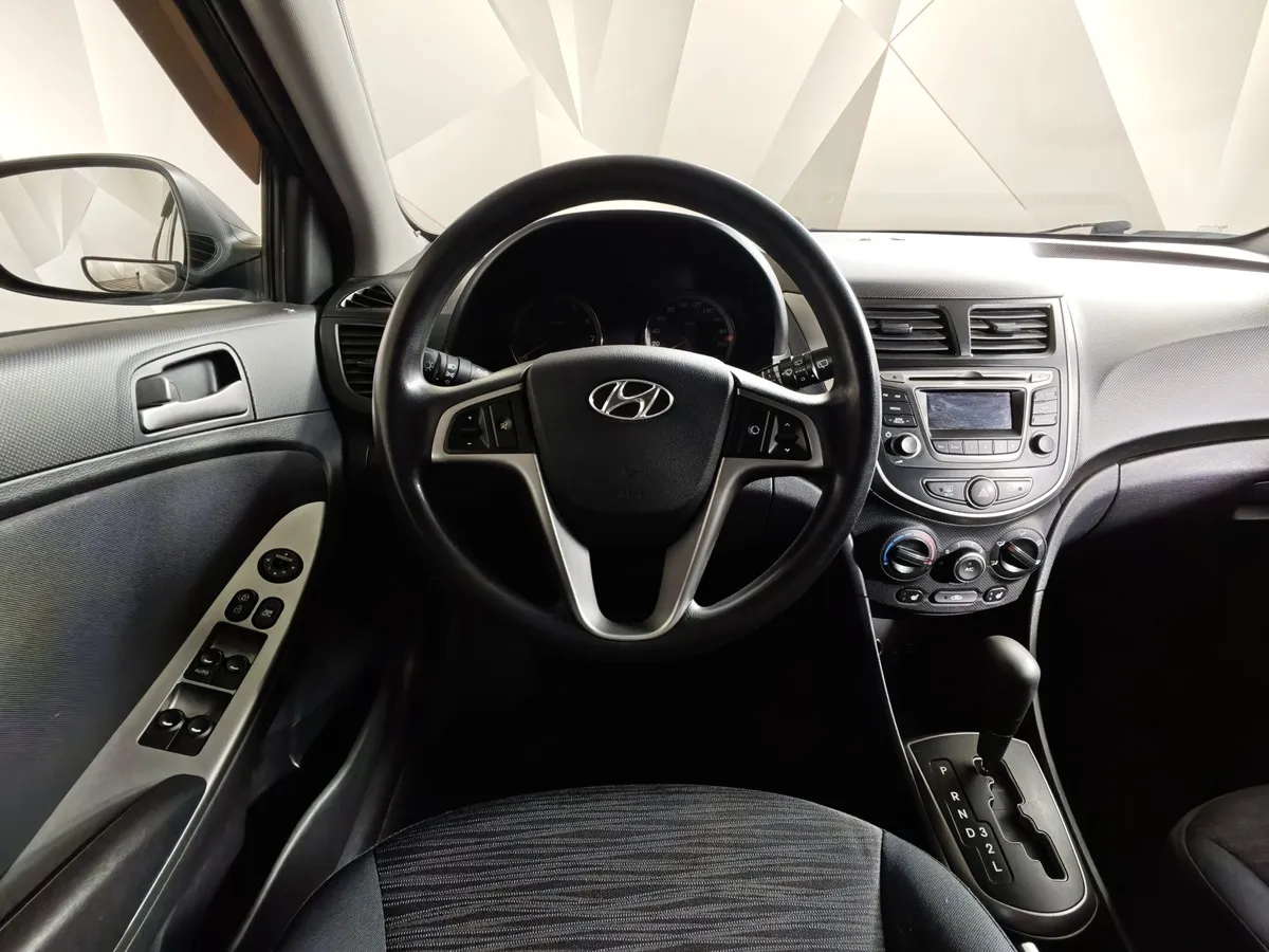 Hyundai Solaris 1.4 AT (107 л.с.) Classic Коричневый в АВИЛОН. Слайд №20