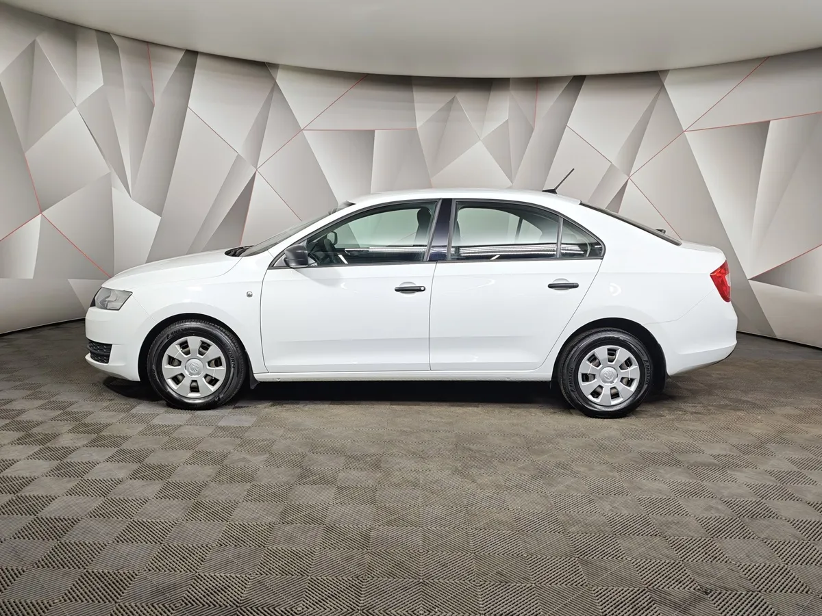 Skoda Rapid 1.6 MT (90 л.с.) Белый в АВИЛОН. Слайд №5