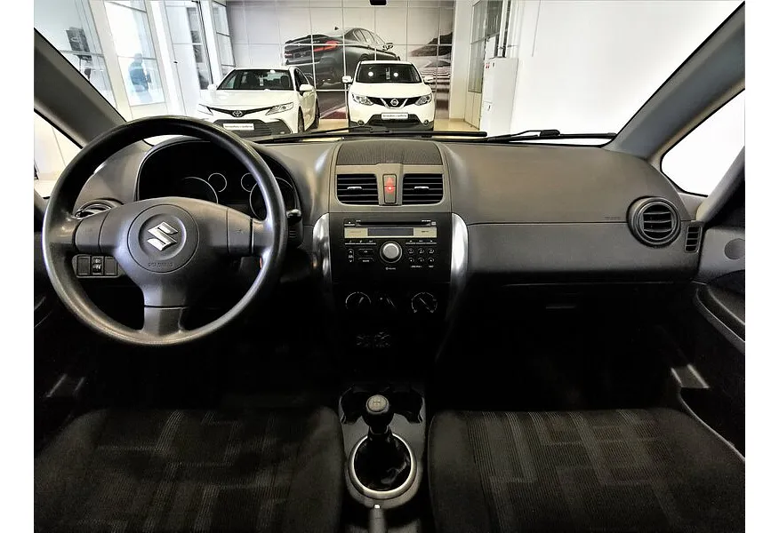 Suzuki SX4 1.6 MT (107 л.с.) Серебристый в АВИЛОН. Слайд №13