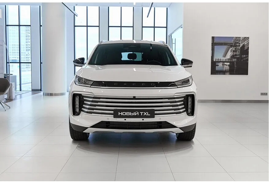 EXEED TXL 2.0 8AT AWD (197 л.с.) Flagship Белый в АВИЛОН. Слайд №2