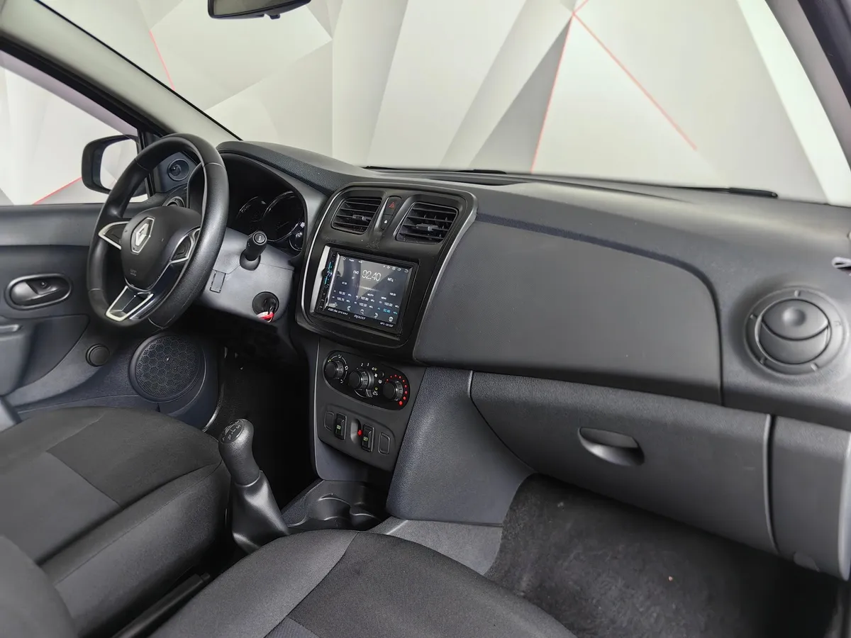Renault Sandero 1.6 MT (82 л.с.) Confort Белый в АВИЛОН. Слайд №12